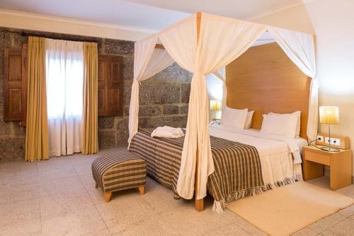 Postel nebo postele na pokoji v ubytování Hotel Rural de Charme Maria da Fonte