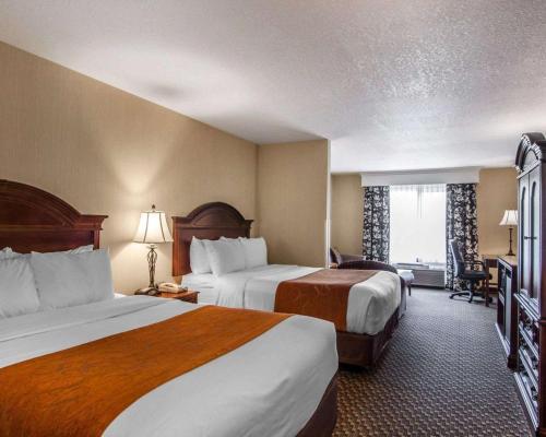 מיטה או מיטות בחדר ב-Comfort Suites Corvallis