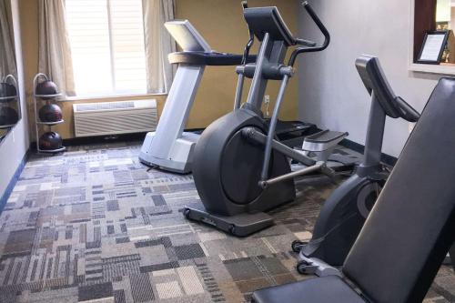 a gym with two exercise bikes in a room at Quality Inn in Clarion