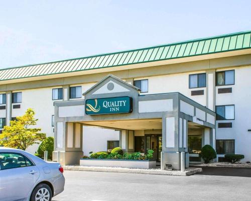 a hotel with a car parked in front of it at Quality Inn Harrisburg - Hershey Area in Harrisburg