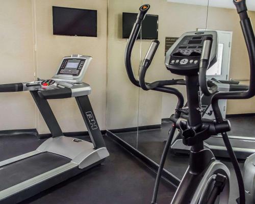 a gym with a phone on a treadmill at SureStay Plus by Best Western Jonestown Lebanon Valley in Jonestown