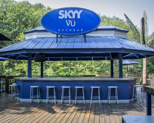a blue bar with stools on a deck at The Woodlands Inn in Wilkes-Barre
