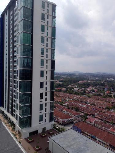 an aerial view of a tall white building at Bangi Studio Suite - Netflix in Kampong Sungai Ramal Dalam
