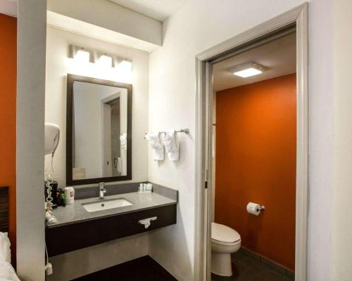 a bathroom with a sink and a toilet at Sleep Inn Nashville - Brentwood - Cool Springs in Brentwood