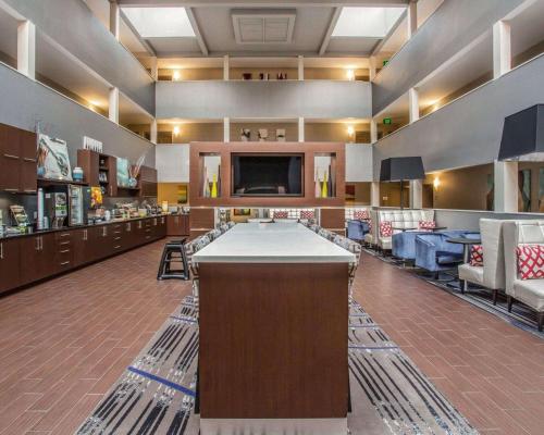a pool table in the middle of a room at Quality Suites Nashville Airport in Nashville