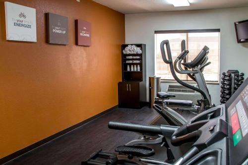 a gym with two exercise bikes in a room at Comfort Suites New Braunfels - San Antonio Area in New Braunfels