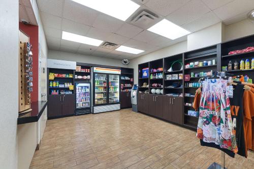 a store aisle of a store with a lot of products at Comfort Suites Beachside in South Padre Island