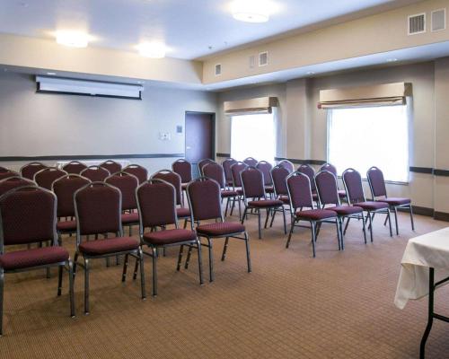 a room with a bunch of chairs in it at Sleep Inn & Suites Round Rock - Austin North in Round Rock