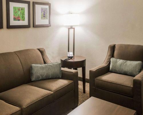 a living room with a couch and a chair at Comfort Inn & Suites Pharr - McAllen in Pharr