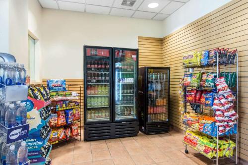 a store with two refrigerators in a grocery store at Sleep Inn Lake Wright - Norfolk Airport in Norfolk