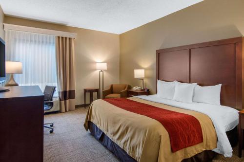 Ένα ή περισσότερα κρεβάτια σε δωμάτιο στο Comfort Inn Chester - Richmond South
