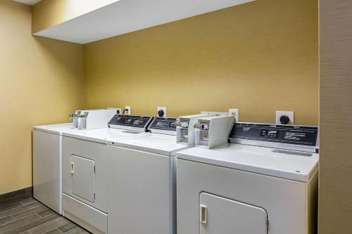 two washing machines are sitting in a room at Comfort Inn Woodstock Shenandoah in Woodstock
