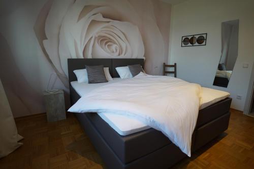 Postel nebo postele na pokoji v ubytování Ferienwohnung am Diersfordter Waldsee