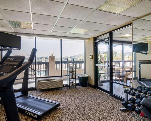 a room with a gym with a view of a balcony at Quality Inn Troutville - Roanoke North in Troutville