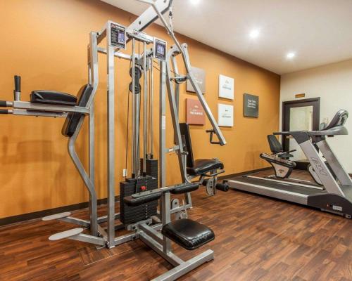 a gym with several tread machines in a room at Comfort Suites Wenatchee Gateway in Wenatchee