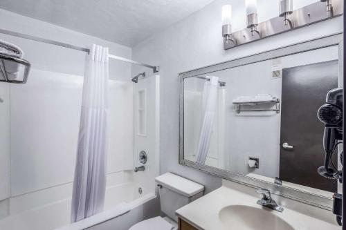 a bathroom with a sink and a toilet and a shower at Quality Inn in Moses Lake