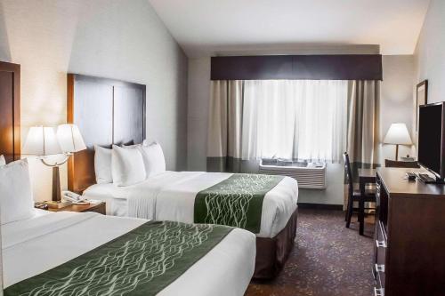 מיטה או מיטות בחדר ב-Comfort Inn Federal Way - Seattle