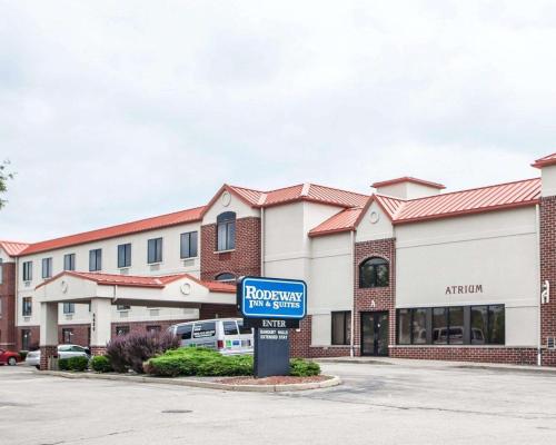 a sign in front of a building at Rodeway Inn & Suites Milwaukee Airport in Milwaukee