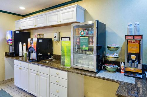 a kitchen with a counter with a refrigerator at Quality Inn in Princeton