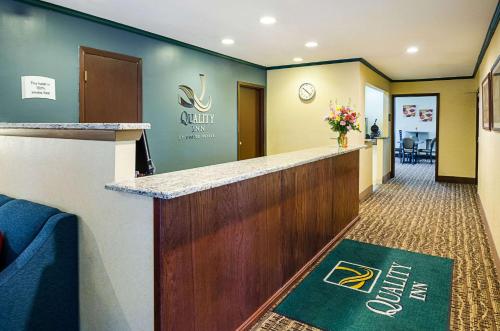 a lobby of a dental office with a reception counter at Quality Inn in Princeton