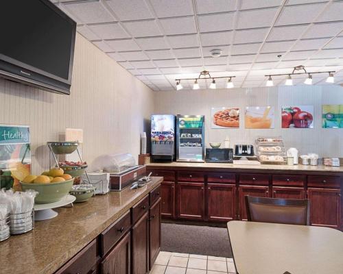 a kitchen with a counter with food on it at Quality Inn Shepherdstown in Shepherdstown
