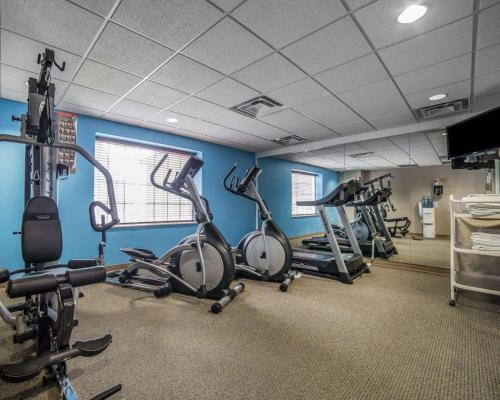 a gym with several exercise bikes in a room at MainStay Suites Casper in Casper