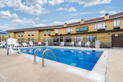 a pool in front of a hotel at Quality Inn & Suites Brownsburg - Indianapolis West in Brownsburg