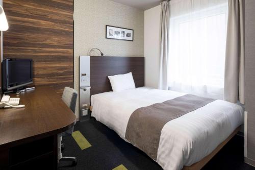 Posteľ alebo postele v izbe v ubytovaní Comfort Hotel Tokyo Higashi Nihombashi