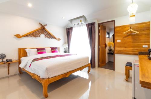 Łóżko lub łóżka w pokoju w obiekcie Anumat Premium Budget Hotel