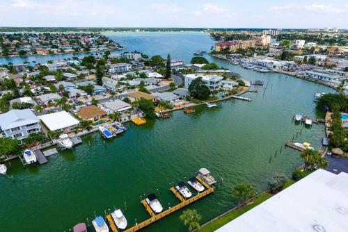 an aerial view of a marina with boats in the water at Treasure Island Hotel and Marina in St Pete Beach