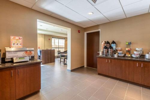 a lobby of a hospital with a counter with food at Comfort Inn & Suites - Harrisburg Airport - Hershey South in Middletown