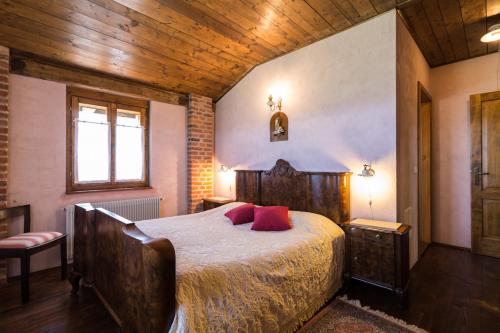 Postel nebo postele na pokoji v ubytování Agriturismo Borg da Ocjs