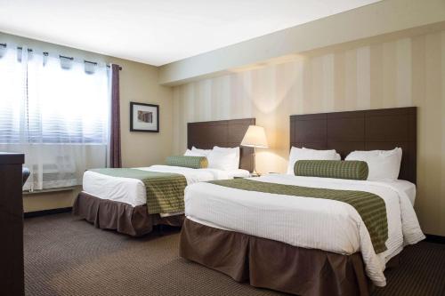 Postel nebo postele na pokoji v ubytování Clarion Hotel & Conference Centre