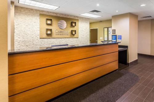 a lobby with a reception desk in a hospital at Comfort Inn & Suites Dalton West in Dalton