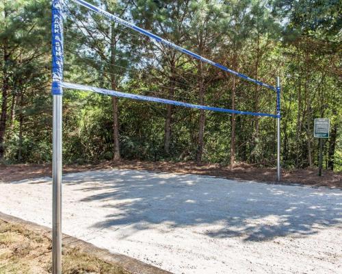 a net on a basketball court in a park at Suburban Studios Kennesaw-Marietta North in Kennesaw