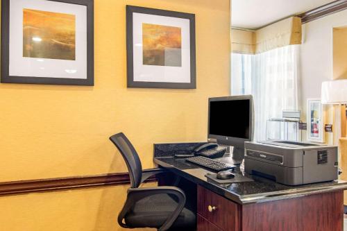 an office with a desk with a computer and a printer at Sleep Inn & Suites Athens South in Athens
