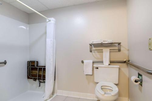 a bathroom with a toilet and a shower at Quality Inn Osceola in Osceola