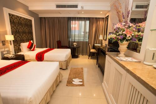 Letto o letti in una camera di Hope Land Hotel 46/1