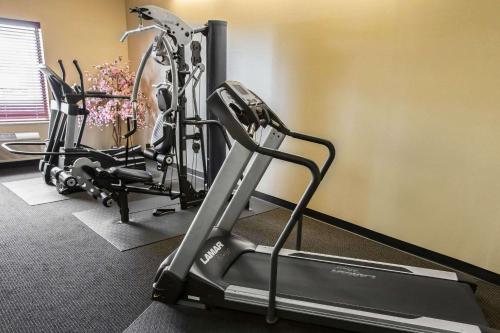 a gym with two exercise bikes and a treadmill at Comfort Inn Crystal Lake - Algonquin in Crystal Lake