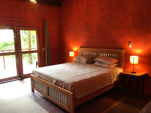 En eller flere senge i et værelse på Morrillo Beach Eco Resort