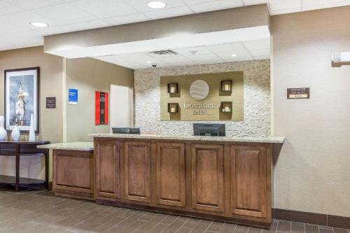 a lobby with a reception desk in a hospital at Comfort Inn Frederick - Ballenger Creek in Frederick