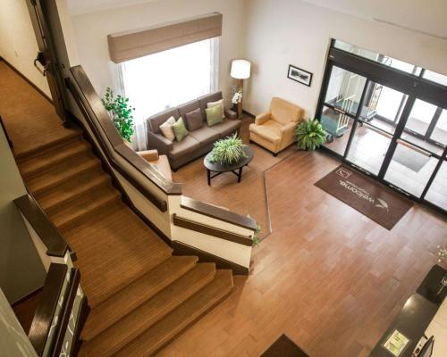 an overhead view of a living room with a staircase at Sleep Inn & Suites Hagerstown in Hagerstown