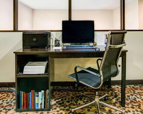 an office with a desk with a computer and a chair at Sleep Inn Rockville in Rockville