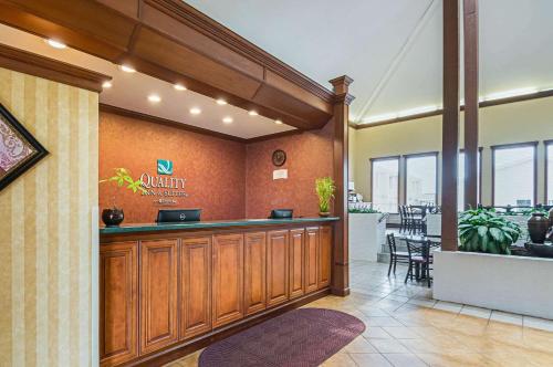 a lobby with a waiting area with a restaurant at Quality Inn & Suites Frostburg-Cumberland in Frostburg