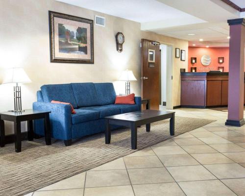 
a living room filled with furniture and a couch at Comfort Inn Civic Center in Augusta
