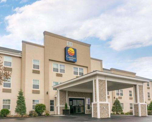 
a large building with a large clock on the front of it at Comfort Inn Civic Center in Augusta
