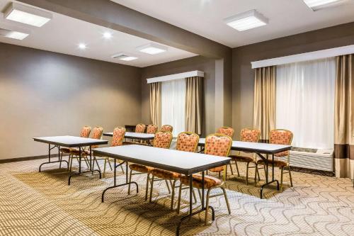 a conference room with tables and chairs in it at Comfort Inn Frederick - Ballenger Creek in Frederick
