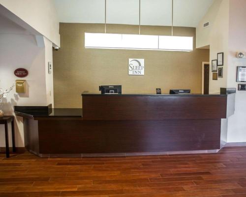 a waiting room with a cash register and a counter at Sleep Inn Rockville in Rockville