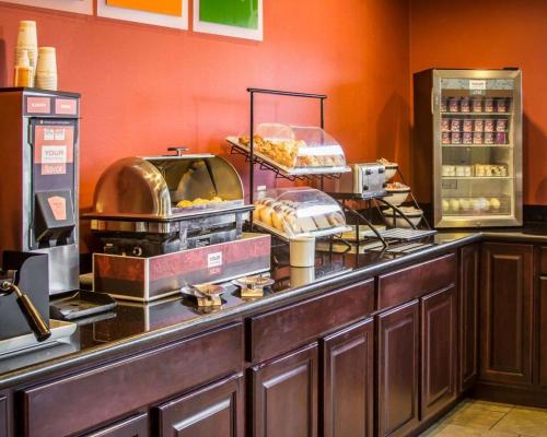a buffet line in a restaurant with some food at Quality Inn & Suites Port Huron in Port Huron