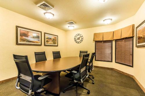 a conference room with a wooden table and chairs at Sleep Inn Springfield South I60 near Medical District in Springfield